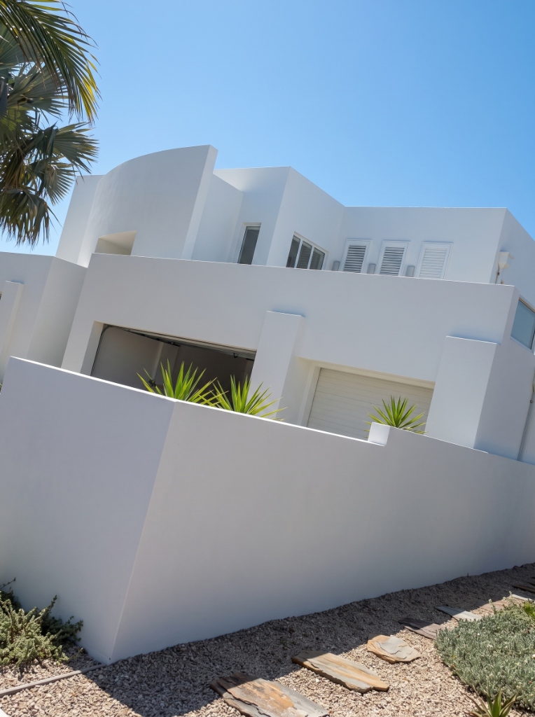 Exterior rendering and paint restorations by Scott Downing