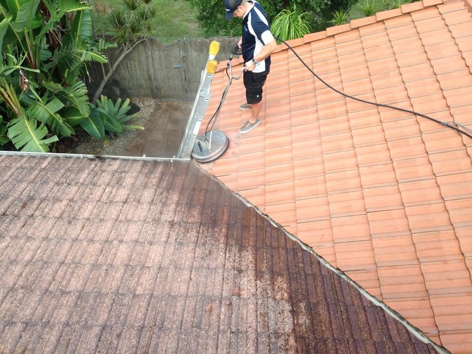 Sleek new guttering and downpipe detail